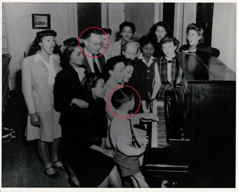 Todd's father (right) and grandfather (left) join Coretta Scott (center) in singing Christmas carols at Antioch College
