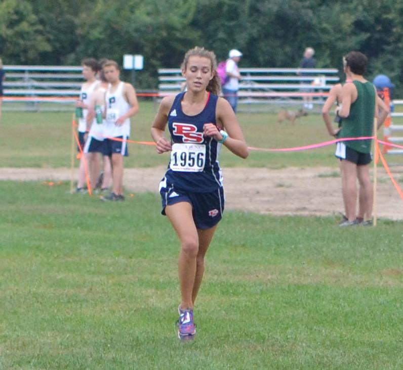 Senior Catherine Franz closes in on the finish line with great placement at Spanish Lake Park. Photo courtesy of Cameryn High.