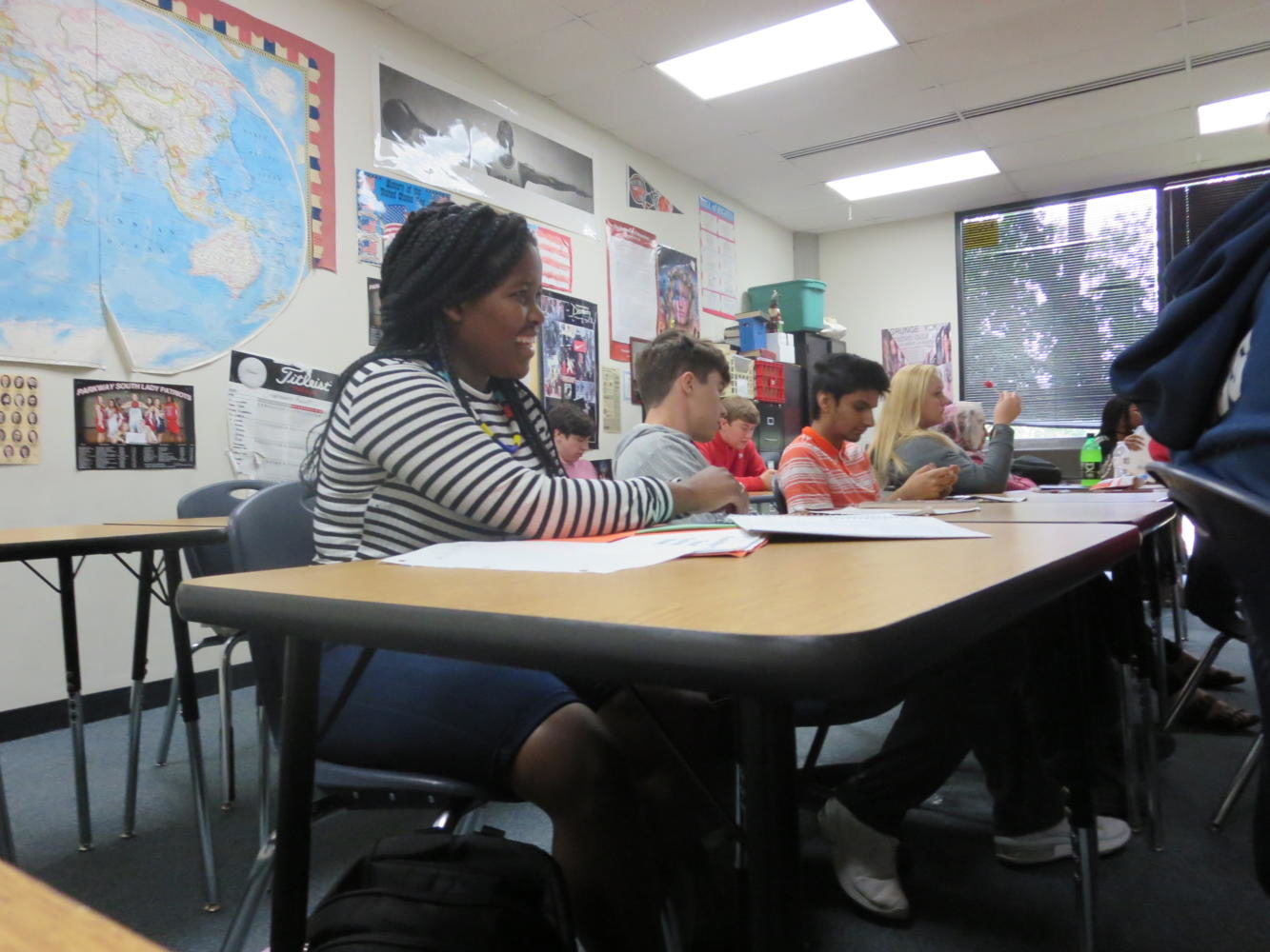 Junior Snegugu Nsimbi listens carefully in Government class. Nsimbi is from South Africa. Photo by Gabby Naucke.