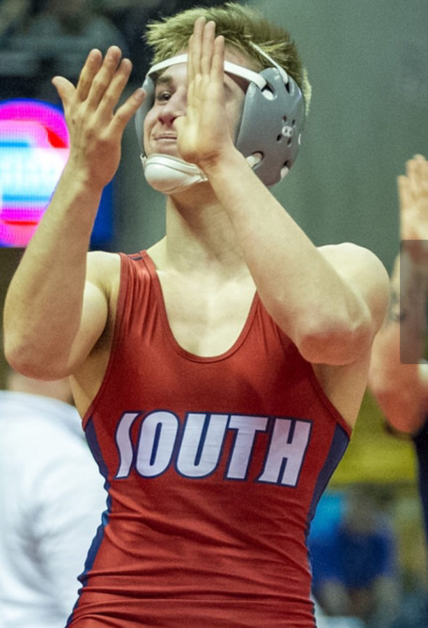 Junior Garret Kloeppel claps after finding out he made it to the state finals last year. 