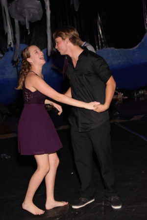 Juniors Audrey Feicht and Caleb Wells share a funny moment while on the Homecoming dance floor. 