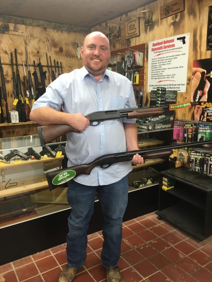Andrew McDaniel, a Republican Missouri Representative, poses in a gun shop. He has proposed two bills which would require Missourians age 18-35 to own a gun.