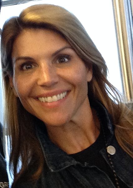 Lori Loughlin, Full House star, is accused of bribing officials to get her two daughter accepted into USC.