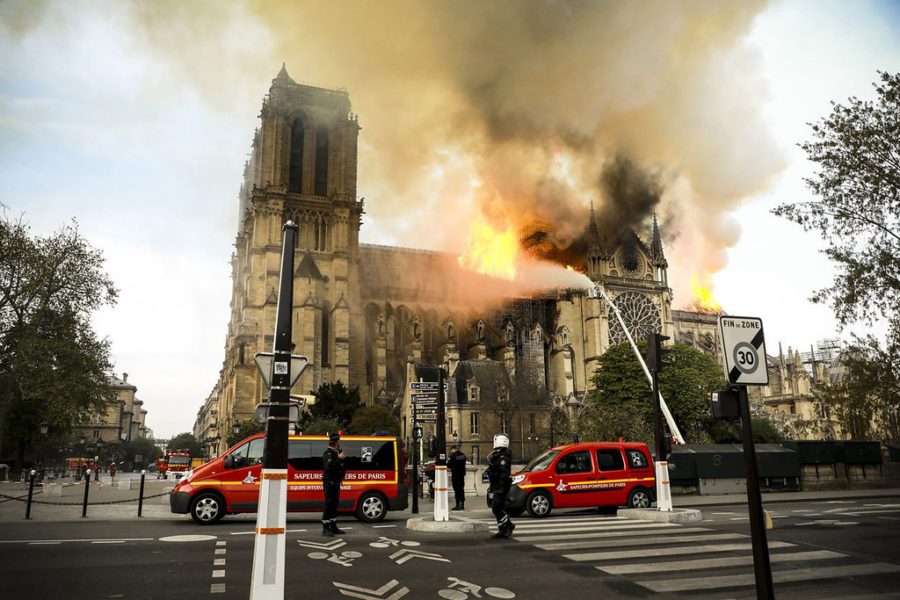 Fire fighters battle the blaze at Notre Dame Cathedral in Paris.