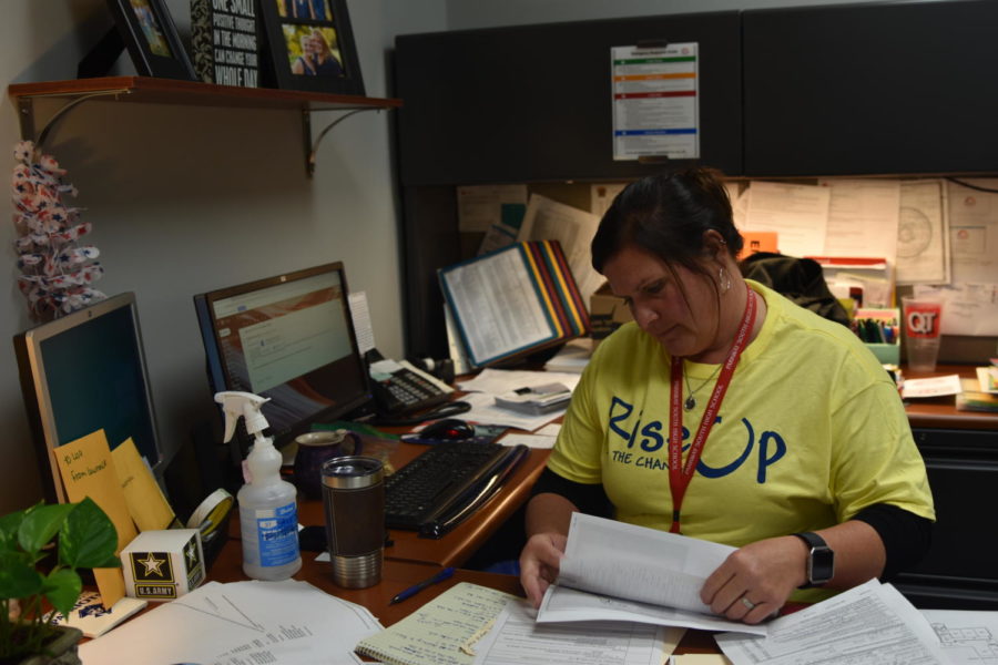 Building manager Lisa Marcinkiewicz works at her desk. Marcinkiewicz is in charge of the drills at South High.