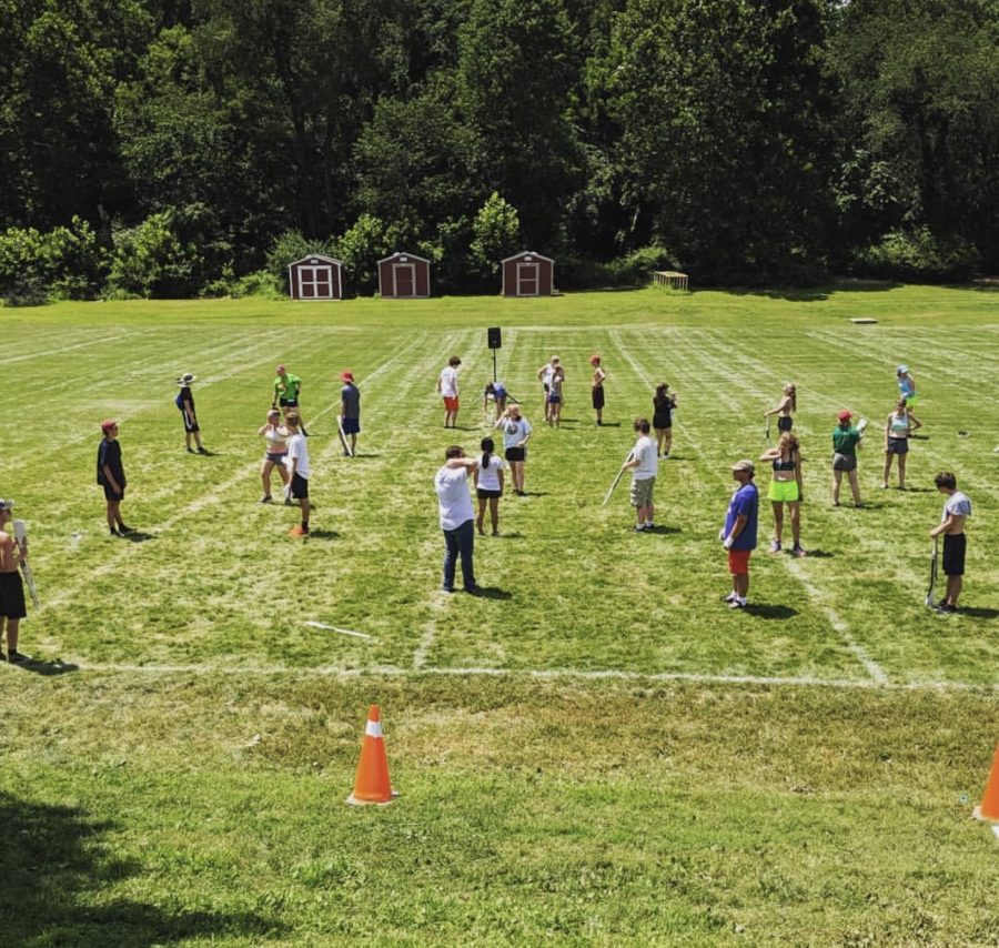 Members of the Spirit of '76 marching band practice on the lower field. This year the band had to share the lower field with the football team. 