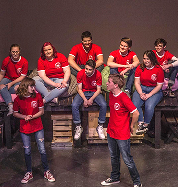 Members of the Factory Reset improv team perform a skit at their first show of the year.