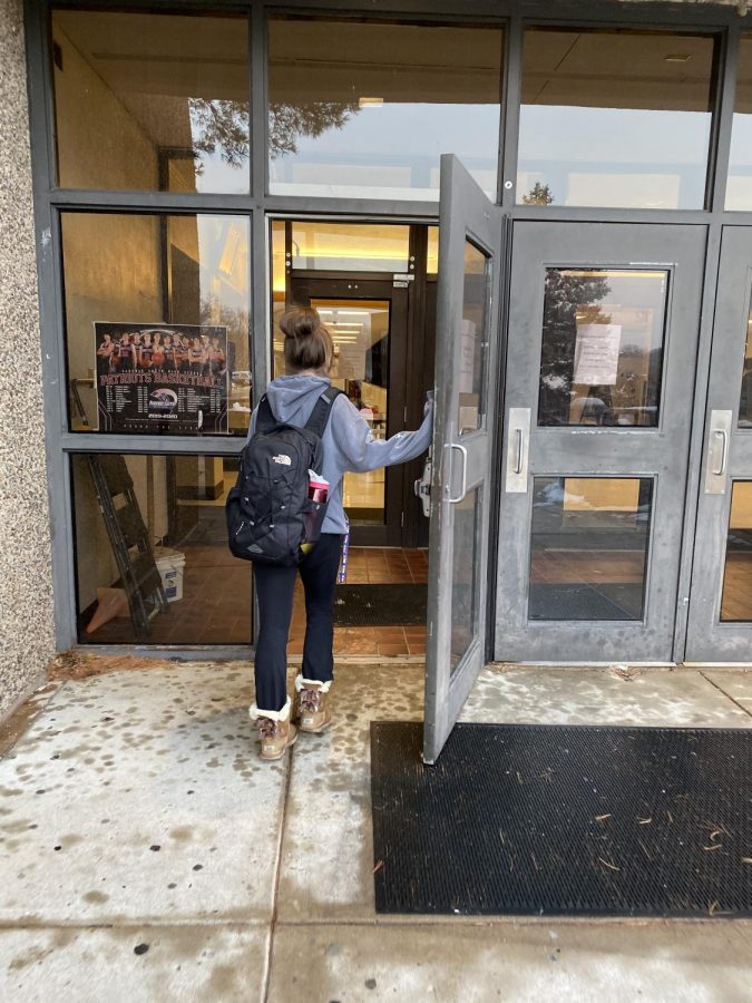 Senior Molly Hogan rushes to get to class on time, Dec. 18. 
