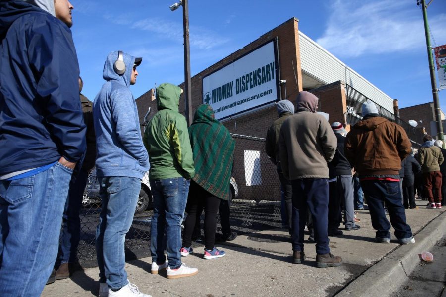 On the second day of legal recreational cannabis sales, a line of people wait outside the Midway Dispensary store, 5648 S. Archer Ave., in Chicago, on Jan. 2, 2020.