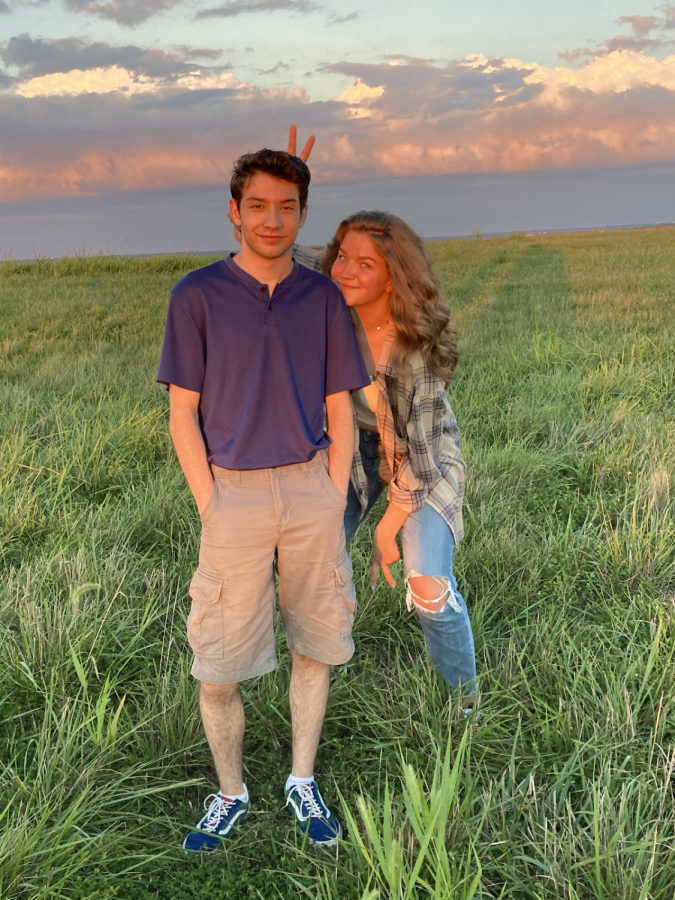 Seniors Aaron Bennett and Emily Paule enjoy the summer sunset together. 