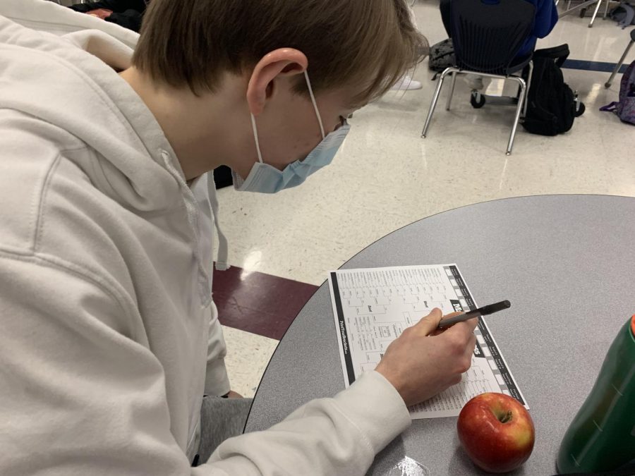 Senior Dane Keller fills out his 2021 March Madness bracket.