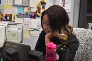Assistant Principal Brionne Smith works at her desk. Smith is currently a principal at West, but will be moving to South next school year. 
