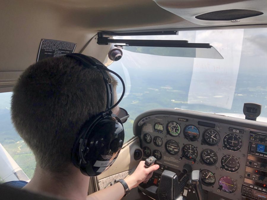 Senior Brooks Hoyt concentrates on keeping his plane in the air after earning his pilots license. 