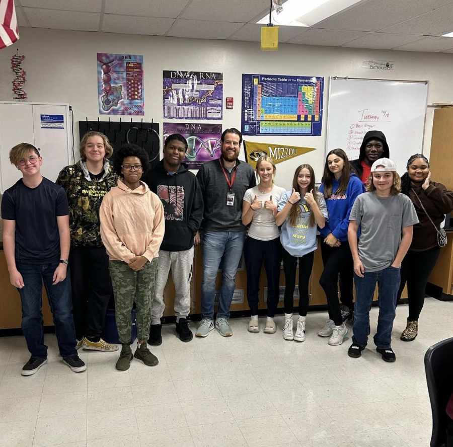 Mr. Zerman takes a picture with one of his Biology classes. 