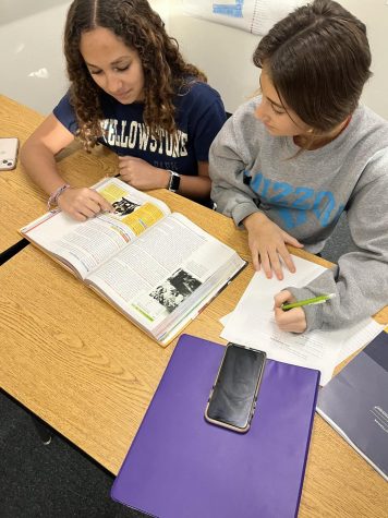 Freshman Abigail Eickhoff works with freshman Ava Bucher in history class. Eickhoff often has trouble getting into her math Ac Lab.