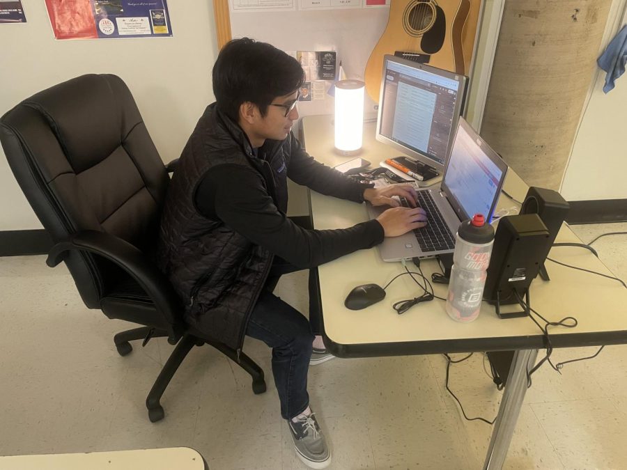 English teacher Anton Ruiz works on writing an email during his planning period. Ruiz was named Novembers Teacher of the Month