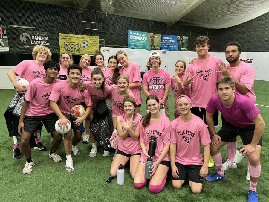 Members+of+the+Pink+Cows+smile+to+take+another+victory+picture.
