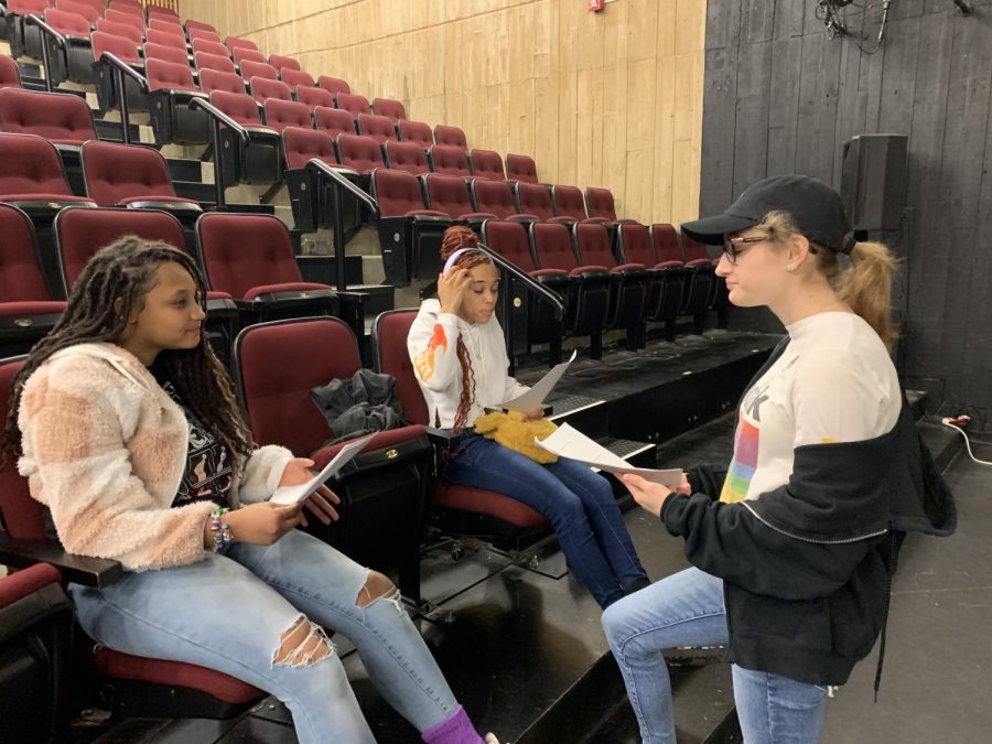Senior A+ tutor Kyleigh Barnett works with sophomore Kayla Robertson and freshman Bryana Robertson in Intro to Theatre class. 