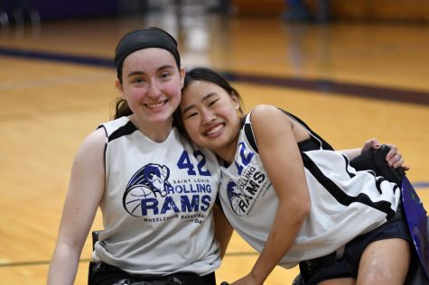 Sophomore Josie Portell and freshman Mia Balella pose for a picture before a recent Rolling Rams game.