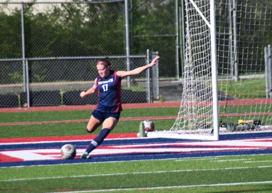 Senior Audrey Goodyear clears the ball down the field during a recent game. Photo by Tatum Nelson. 