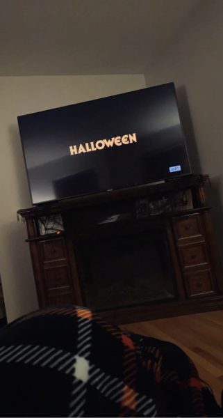 The opening credits begin on the scariest movie of all time, Halloween. 