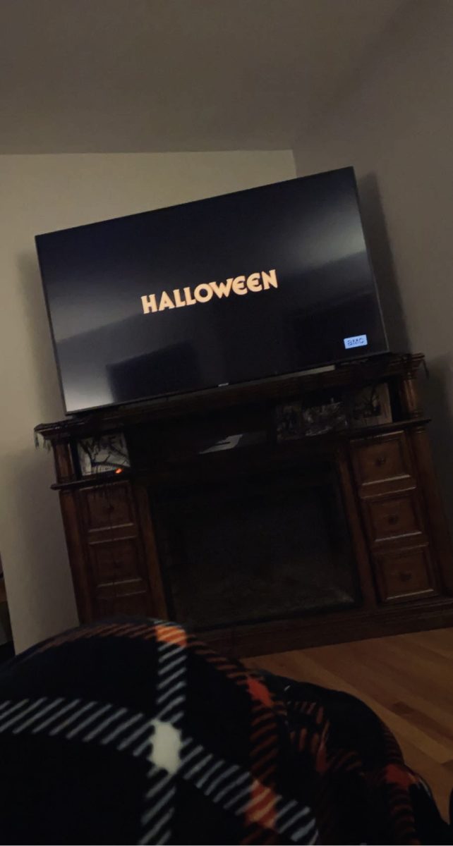 The opening credits begin on the scariest movie of all time, Halloween. 