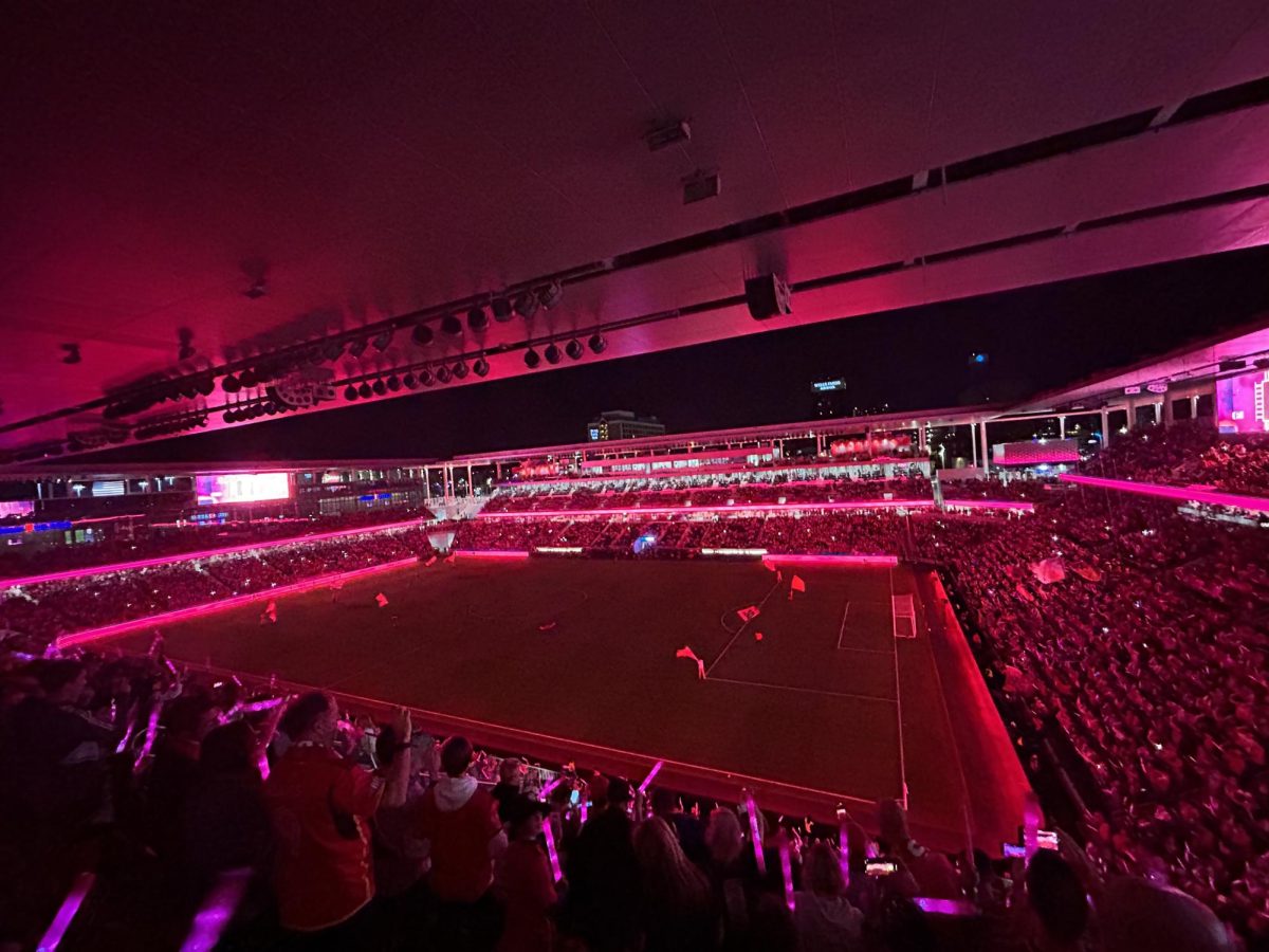 City Park is lit up in red for Citys last regular season game against Seattle.