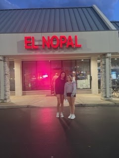 Sophomores Sofi Bertanjoli and Addie Bogad take a picture outside the popular Mexican restaurant, El Nopal. 