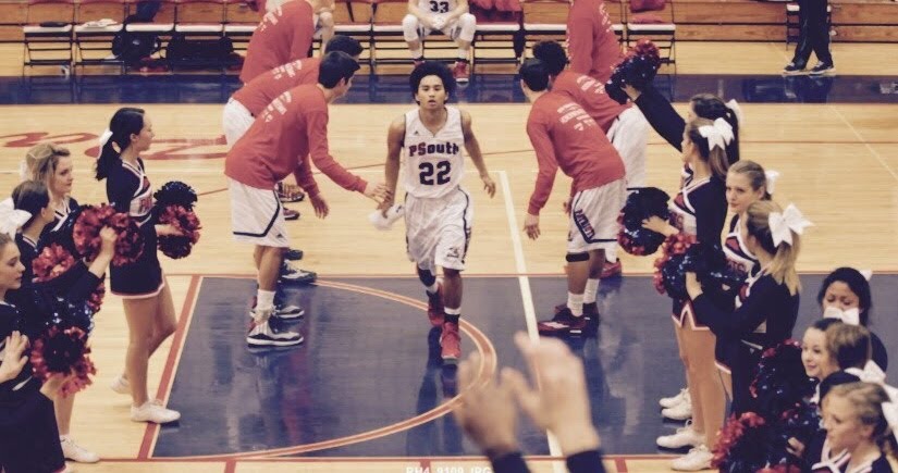 2015 graduate Anton Ruiz, now a South High English teacher, gets introduced at the start of one of his basketball games his senior year. Photo courtesy of Anton Ruiz.