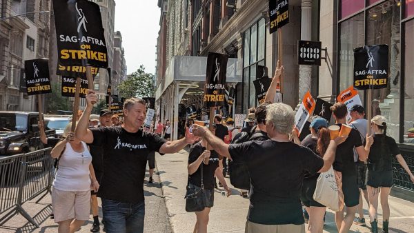SAG-AFTRA members picket on the streets of New York City. 