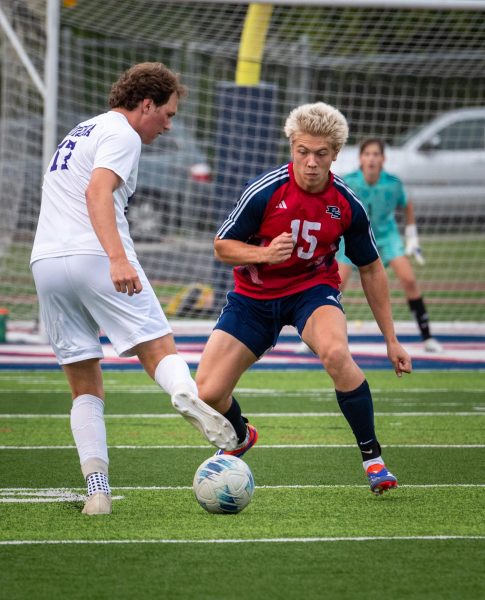 Junior defender John Tanurchis blocks a shot from a Eureka player during a game, Sept. 3. The Patriots beat the Wildcats for the first time in 22 years. 