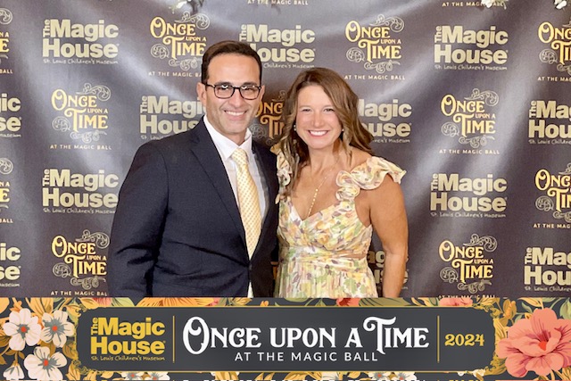 Business teacher Amy Boscan poses for a picture with her husband, Dorian, during a fundraiser at the Magic House.