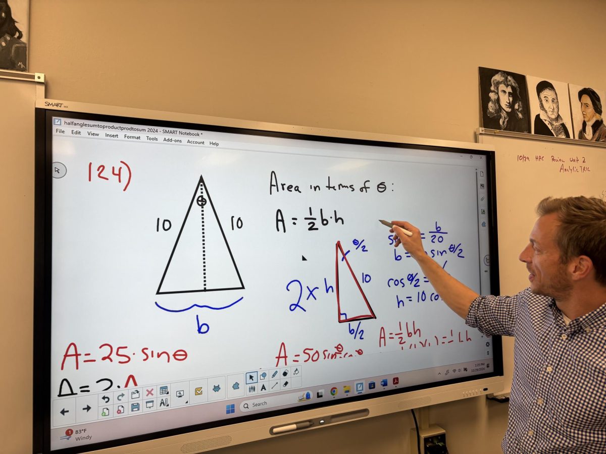 Math teacher Mark Kozeny uses his new SMART Board daily in his Geometry classes.