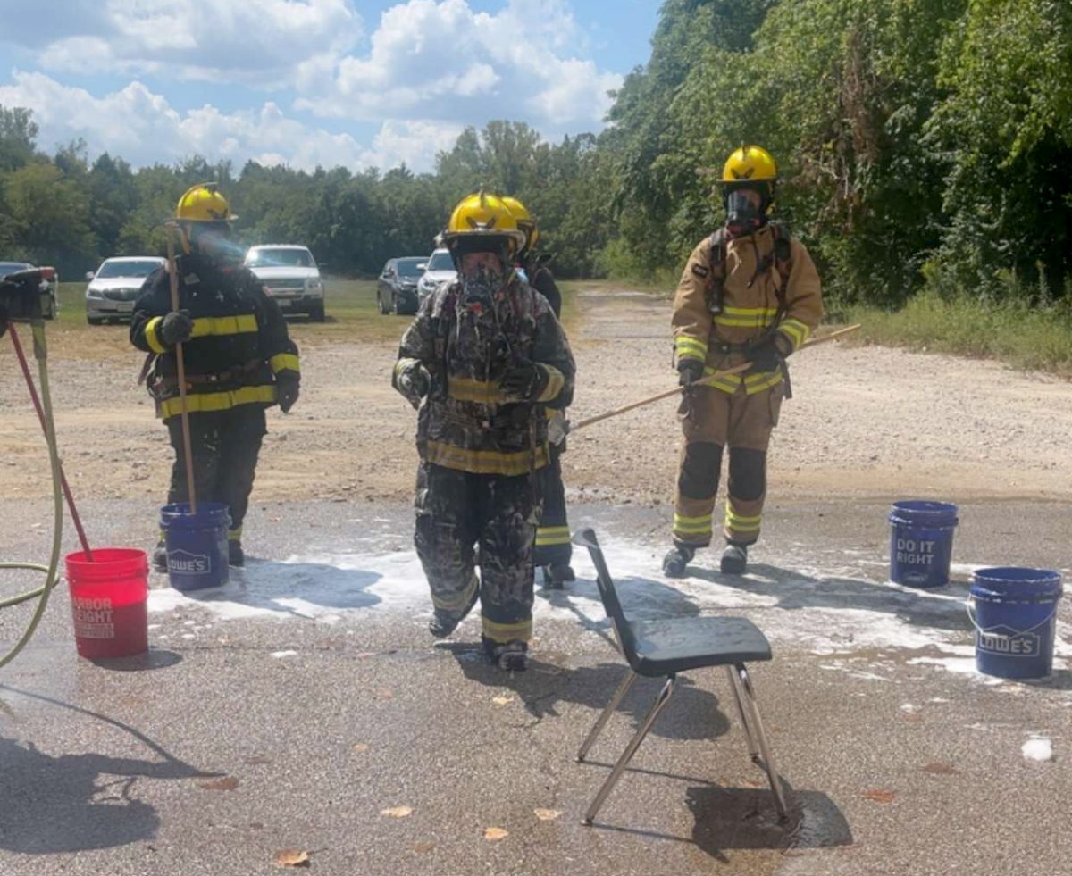 Students in the South Tech Firefighting program wear fire gear during class.