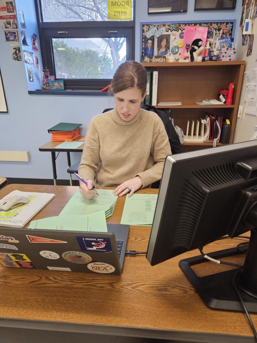 Math teacher Christina Alexander spends time at her desk grading finals. Next year finals will be held before winter break.