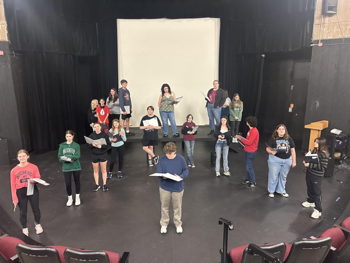 The cast of "Peter and the Starcatcher" rehearses in the theater.