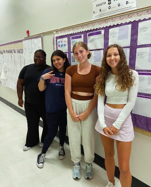 FACS Club President Ellen Piotraschke takes a pictures along with vice presidents Jewel Mobley, Rand Al-Yuwaili and Ally Horstmann.