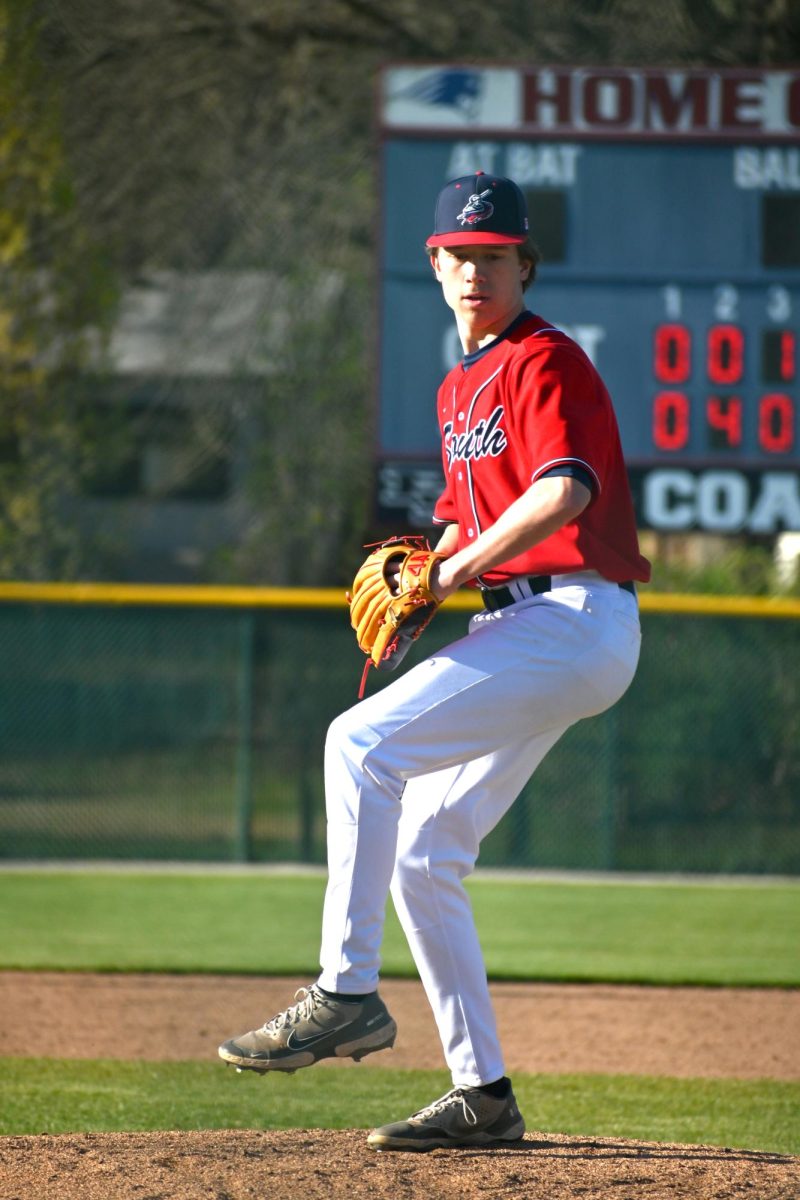 Senior pitcher Parker Wolf gets ready to release the ball in a game last year.