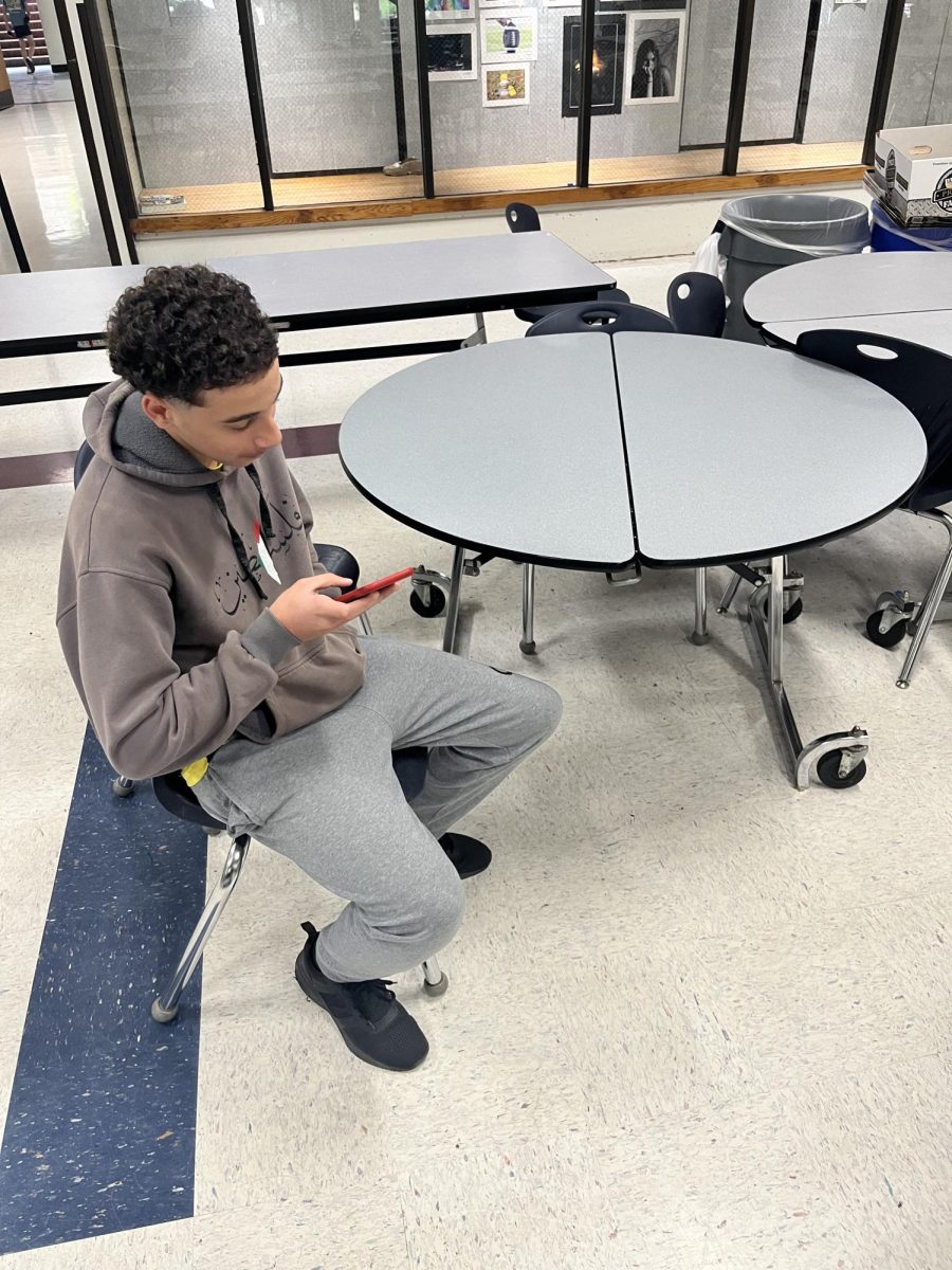 Freshman Noor Harb scrolls through TikTok during the school day. Next year students will not be able to have their cell phones during the school day, thanks to a law passed by the state of Missouri.