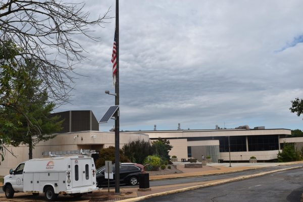 American flag in front of South High