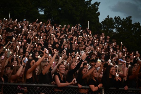 Members of the Posse show their spirit at Homecoming, moments before their Bluetooth speaker is taken away by administration
