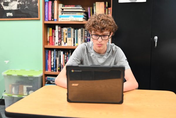 Sophomore Mason Foresman updates his Fantasy Football roster during ac. lab. 