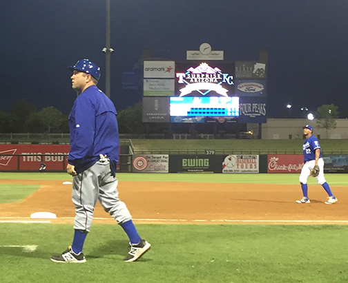 Business teacher Paul Kruger coaches on the field during a Rangers Spring Training game against the Kansas City Royals. Photo courtesy of Paul Kruger.