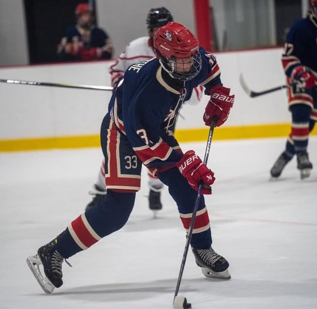 Sophomore Will Garth moves down the ice