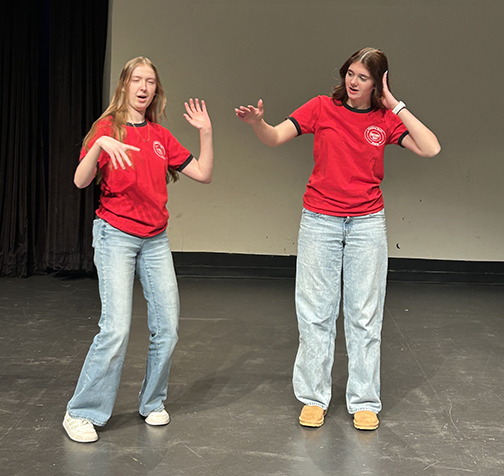 Juniors Jossalin Day and Sophie Griese dance during an improv scene during dress rehearsal for tomorrow's show.