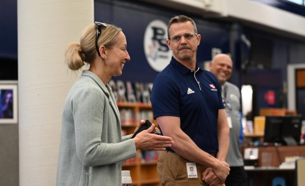 Superintendent Dr. Melissa Schneider introduces Dr. Greg Wagener as the new head principal of South High. 