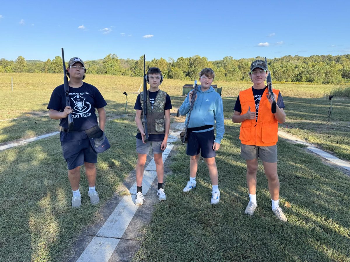 Members of the South clay target team practice during the season. (L to R) junior Marx Green, freshman Charlie Kane, freshman Walter Pendleton and junior Henry Kane