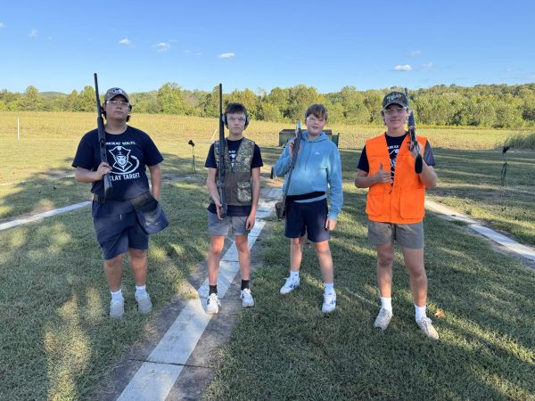 Members of the South clay target team practice during the season. (L to R) junior Marx Green, freshman Charlie Kane, freshman Walter Pendleton and junior Henry Kane